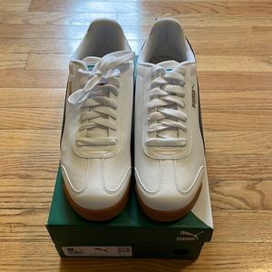 Puma Roma Basic + Men’s size 11 White w/navy, red and teal details.